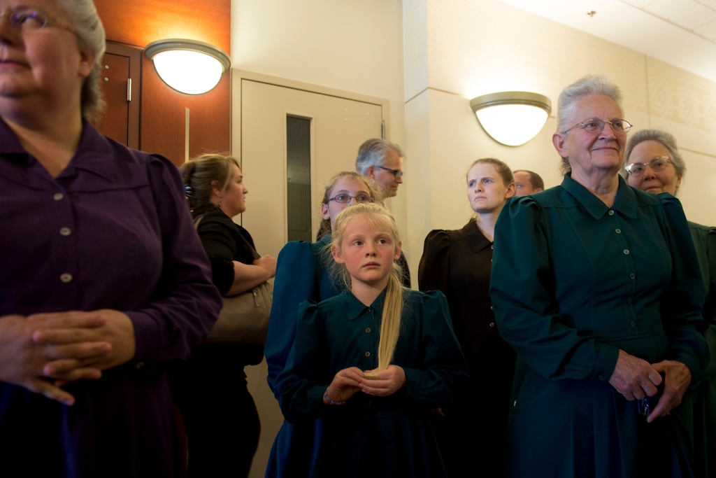 (Jeremy Harmon  |  The Salt Lake Tribune) FLDS women stand outside a courtroom after a UEP hearing in Salt Lake City on Tuesday, June 18, 2019.
