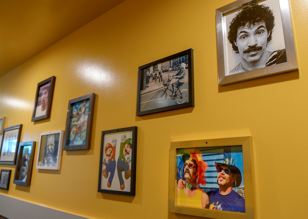 (Leah Hogsten  |  The Salt Lake Tribune) HandleBar, a new "biker" bar in Salt Lake City's Marmalade District, features iconic photos of famous mustached men, including co-owners David Morris and Jesse Wilkerson, bottom right.