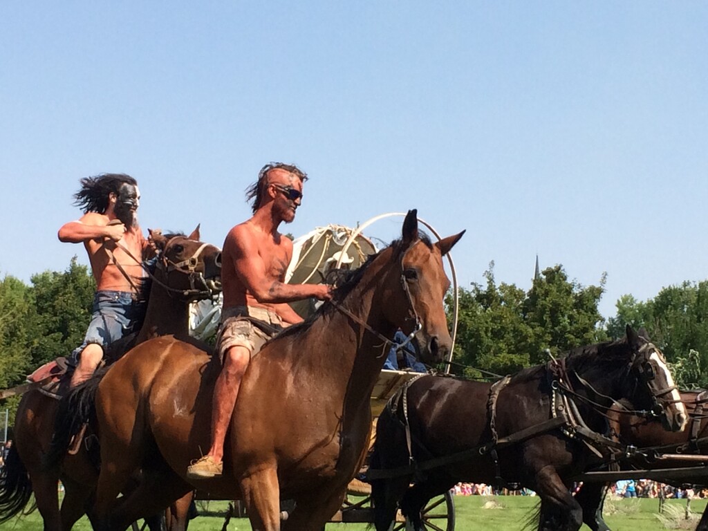 (Robert Gehrke | Tribune file photo) Wellsville — Participants in the annual Sham Battle that is part of the Wellsville Founders Day celebration dress up as Shoshone Indians, settlers and members of the U.S. Army to re-enact the type of skirmishes that took place during the settling of the town by Mormon pioneers.