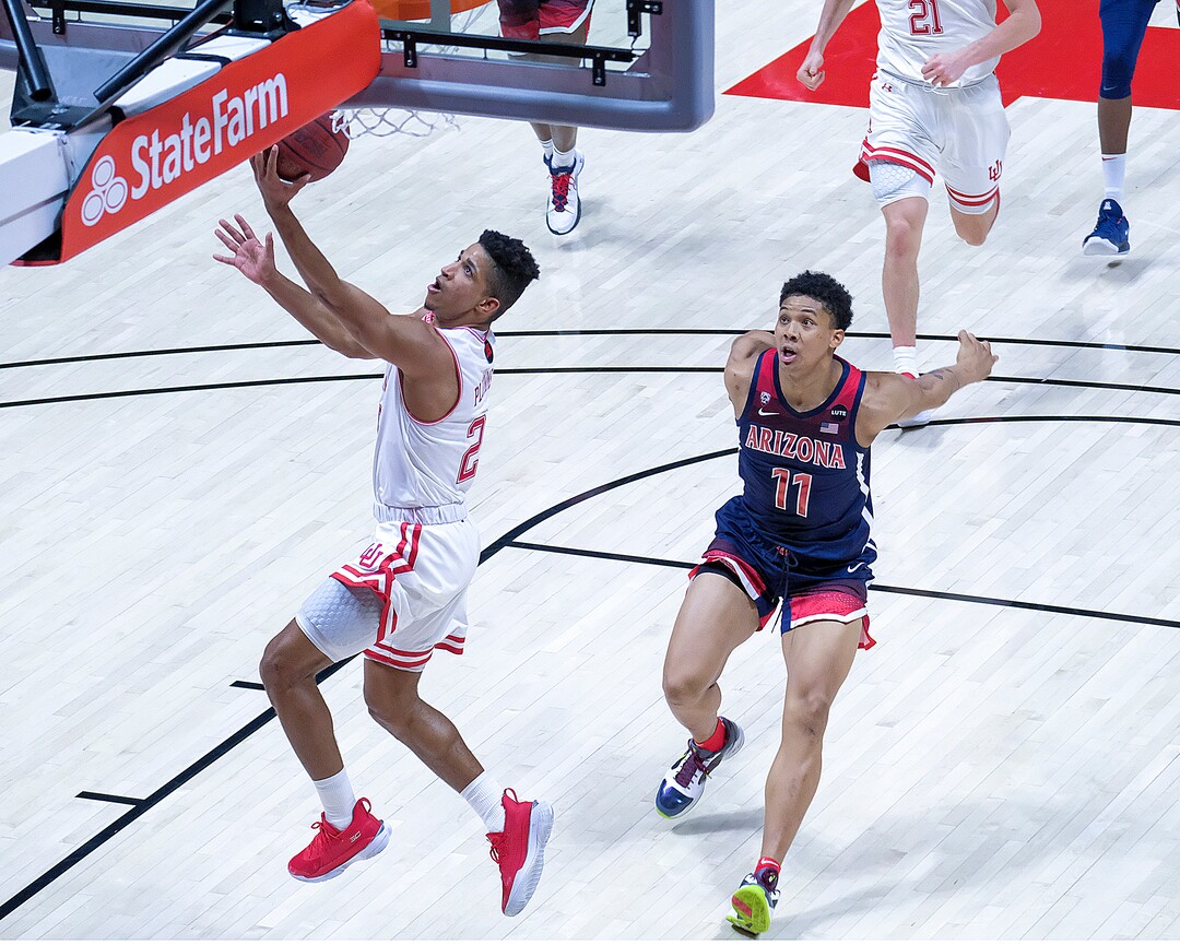 (Leah Hogsten | The Salt Lake Tribune) Utah Utes guard Alfonso Plummer (25) sinks a backward layup as the University of Utah host the Arizona Wildcats, Feb. 4, 2021 at the Jon M. Huntsman Arena.