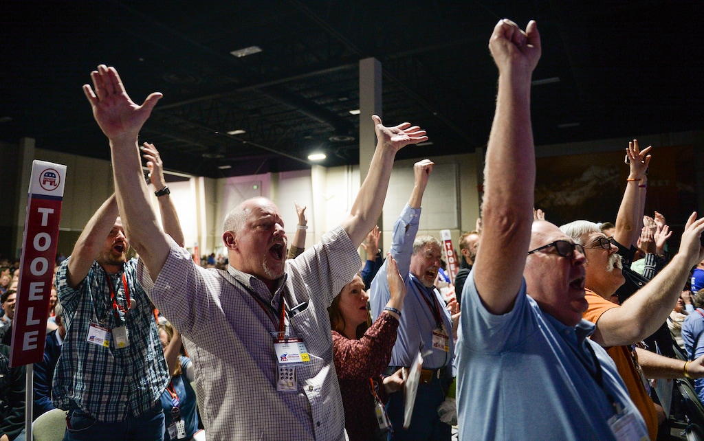 (Chris Samuels | The Salt Lake Tribune) Delegates from Tooele County cheer during the roll call at the Utah Republican Party nominating convention, Saturday, April 23, 2022 in Sandy.
