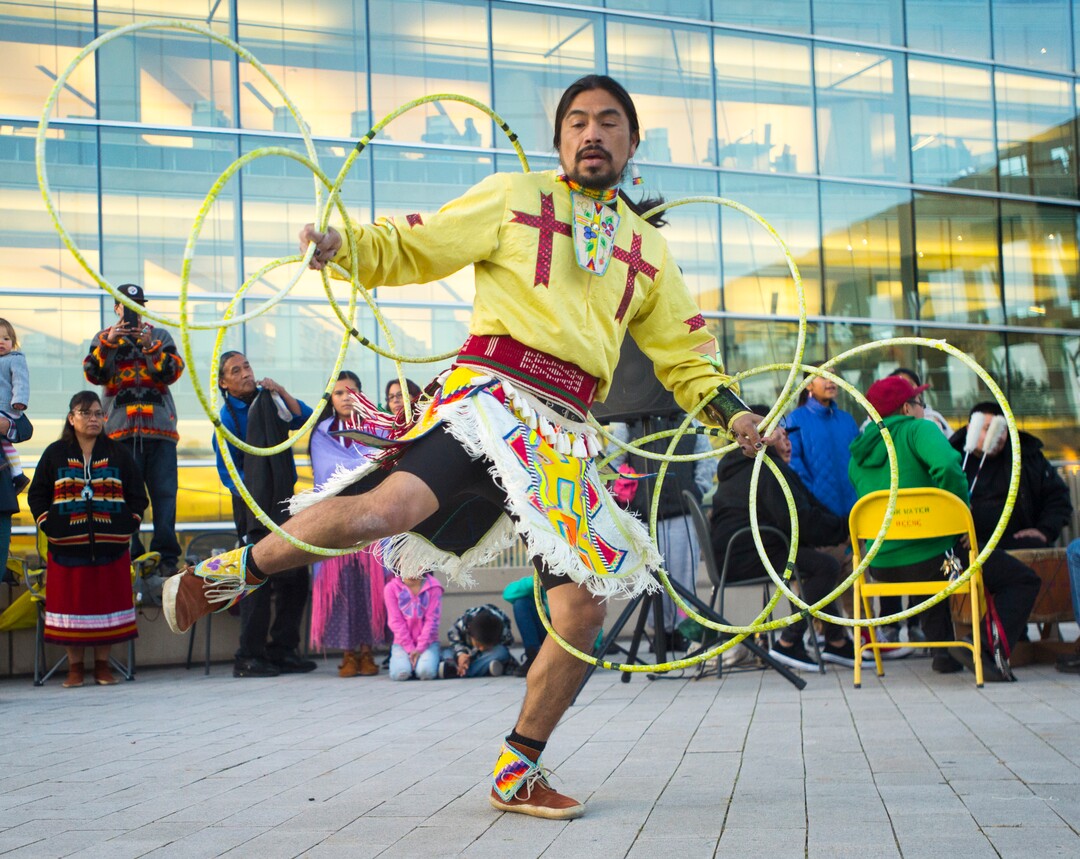 (Rick Egan  |  The Salt Lake Tribune)  Carl Moore, performs a hoop dance, during the Indigenous Peoples Day celebration, hosted by the Utah League of Native American Voters and PANDOS (Peaceful Advocates for Native Dialogue and Organizing Support) at the Salt Lake City Library, Monday, October 9, 2017.