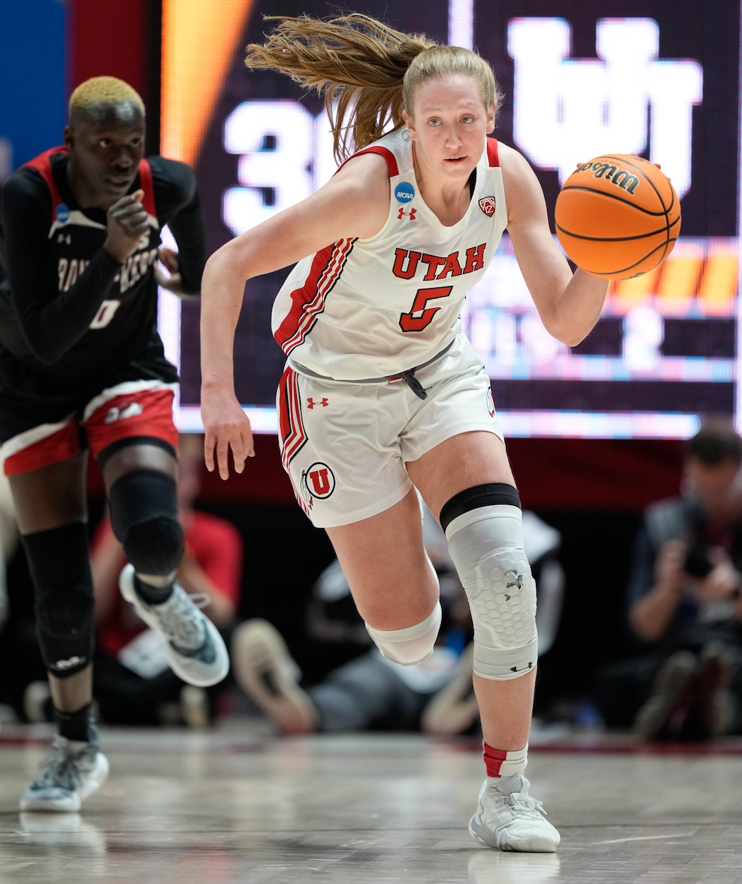 (Francisco Kjolseth | The Salt Lake Tribune) Utah Utes guard Gianna Kneepkens (5) drives the ball down the court past Gardner-Webb of a first-round college basketball game in the NCAA Tournament, Friday, March 17, 2023, in Salt Lake City, Utah.