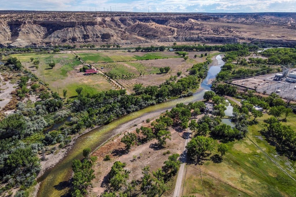 (Anthony Jackson | The Albuquerque Journal via AP) The Animas River flows in Farmington, N.M., on July 22, 2020. The river is a tributary of the San Juan River, part of the Colorado River System.