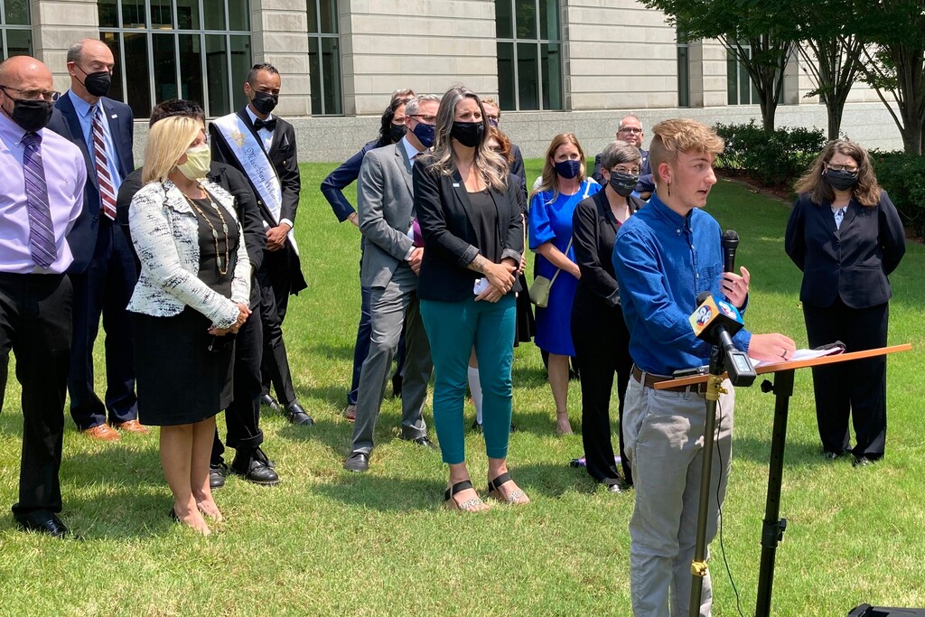 (Andrew DeMillo | AP) Dylan Brandt speaks at a news conference outside the federal courthouse in Little Rock, Ark., July 21, 2021. Brandt, a teenager, is among several transgender youth and families who are plaintiffs challenging a state law banning gender confirming care for trans minors. A federal judge struck down Arkansas' first-in-the-nation ban on gender-affirming care for children as unconstitutional Tuesday, June 20, 2023.