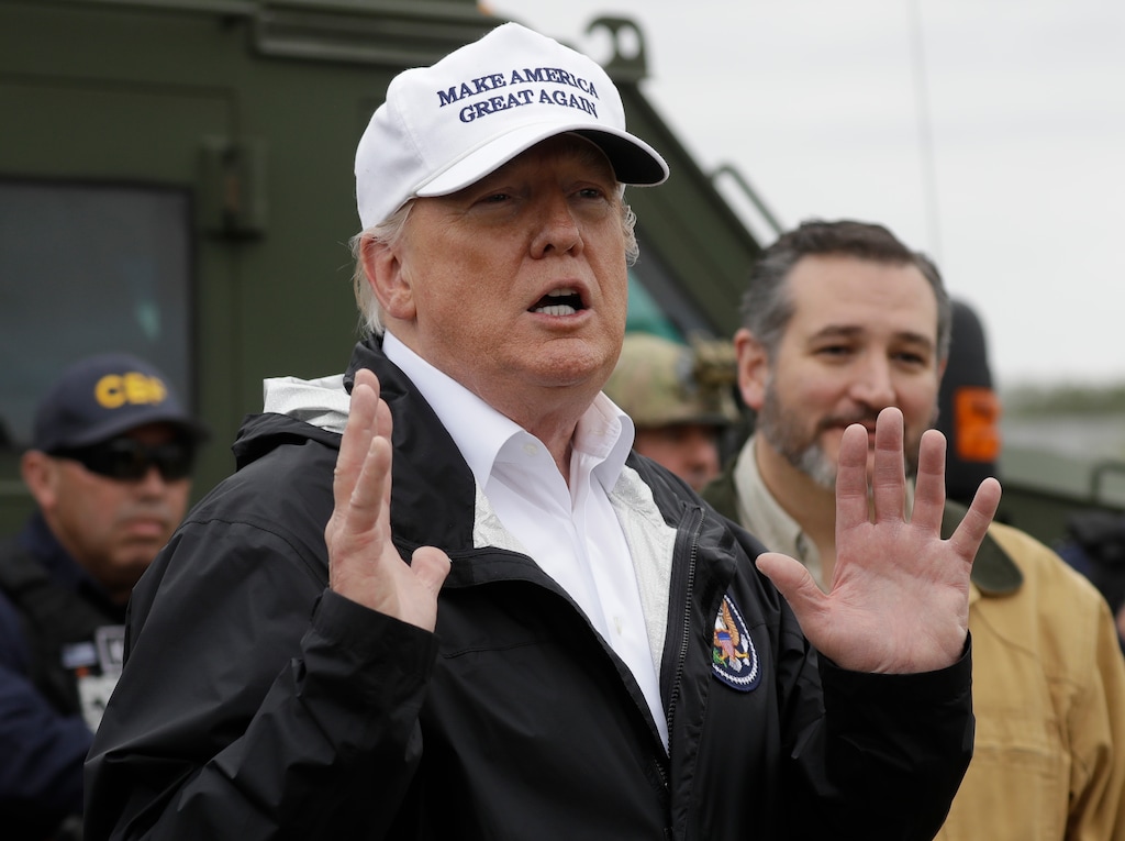 (Evan Vucci | The Associated Press) President Donald Trump speaks as he tours the U.S. border with Mexico at the Rio Grande on the southern border, Thursday, Jan. 10, 2019, in McAllen, Texas, as Sen. Ted Cruz, R-Texas, listens at right.