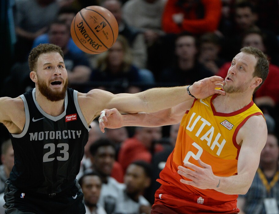 (Francisco Kjolseth | The Salt Lake Tribune) Detroit Pistons forward Blake Griffin (23) battles Utah Jazz forward Joe Ingles (2) for a loose ball in the first half of their NBA game at Vivint Smart Home Arena Monday, Jan. 14, 2019, in Salt Lake City.