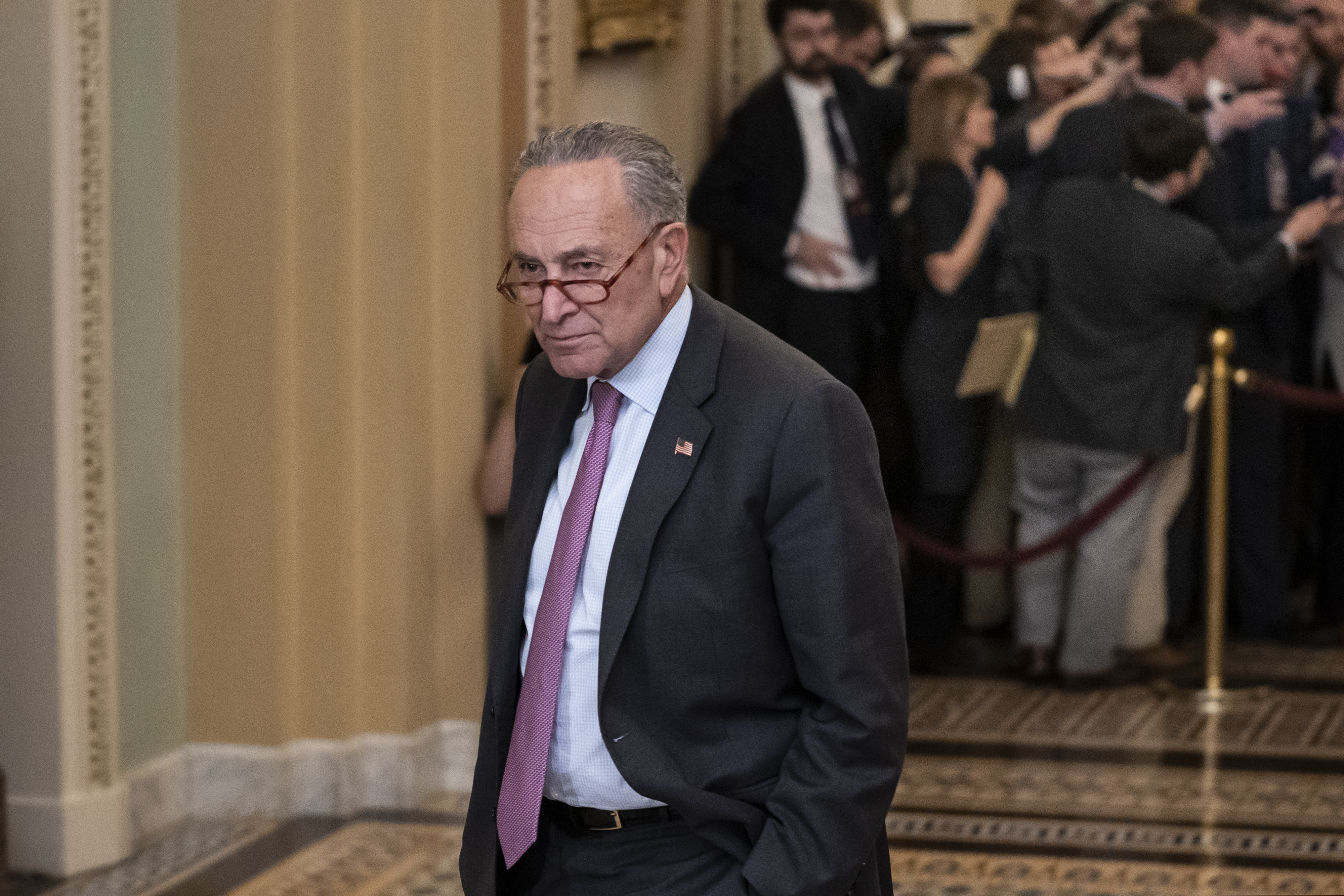 (J. Scott Applewhite | AP) Senate Minority Leader Chuck Schumer, D-N.Y., pauses outside the Senate chamber during a break as the Senate continues with the impeachment trial of President Donald Trump on charges of abuse of power and obstruction of Congress, at the Capitol in Washington, Wednesday, Jan. 22, 2020.