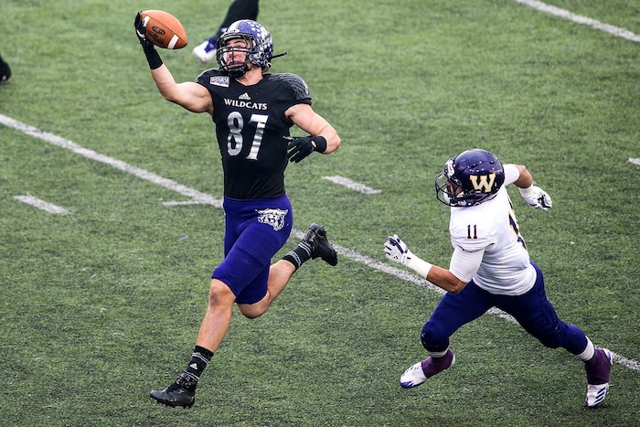 (Chris Detrick  |  The Salt Lake Tribune)  Weber State Wildcats tight end Andrew Vollert (87) makes a one-handed catch past Western Illinois Leathernecks defensive back Eric Carrera (11) during the game at Stewart Stadium Saturday, November 25, 2017.  