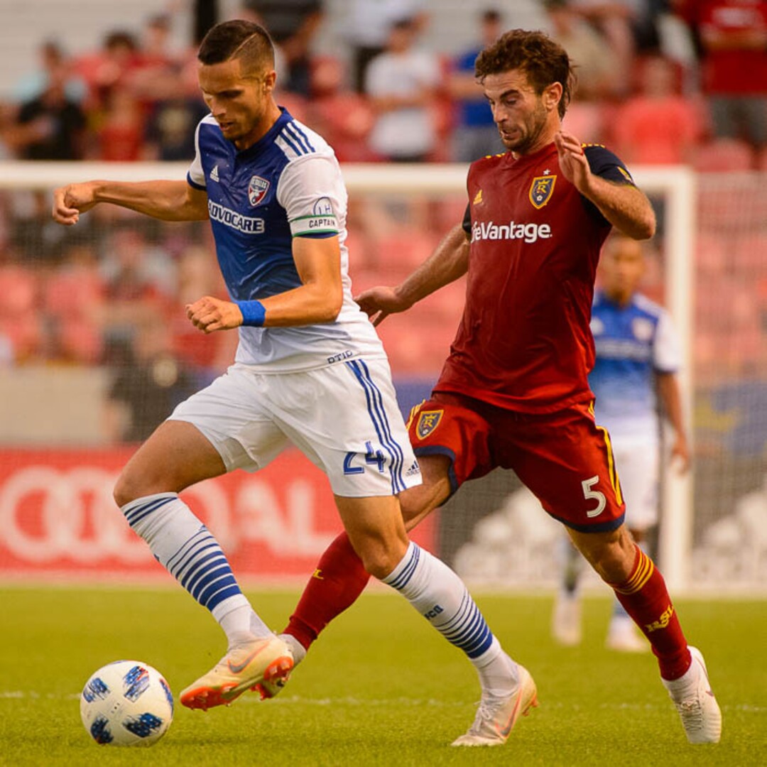 (Trent Nelson | The Salt Lake Tribune)  Real Salt Lake hosts FC Dallas, MLS soccer at Rio Tinto Stadium in Sandy, Saturday July 7, 2018. FC Dallas defender Matt Hedges (24) and Real Salt Lake midfielder Kyle Beckerman (5).
