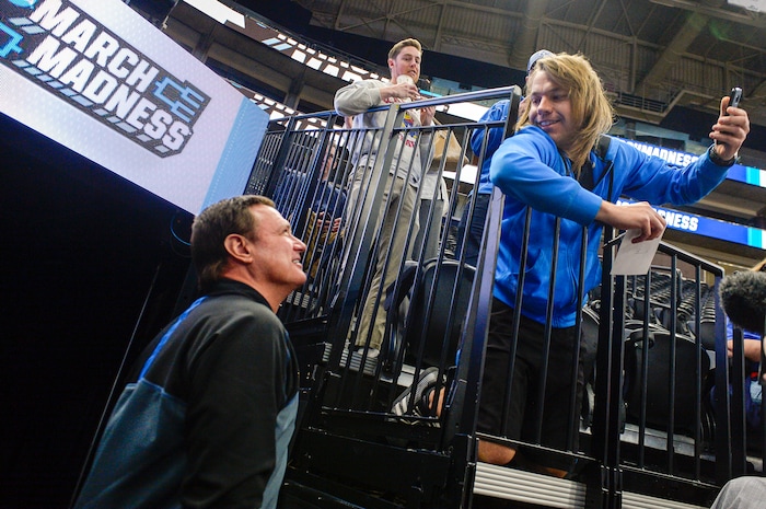 Leah Hogsten  |  The Salt Lake Tribune l-r Kansas Jayhawks head coach Bill Self gets his picture taken with Brent Barthel of Orem.  The Kansas Jayhawks take the court during the 2019 NCAA Division I Men's Basketball Championship, March 20, 2019 in preparation for their first round game against the Northeastern Huskies on Thursday.