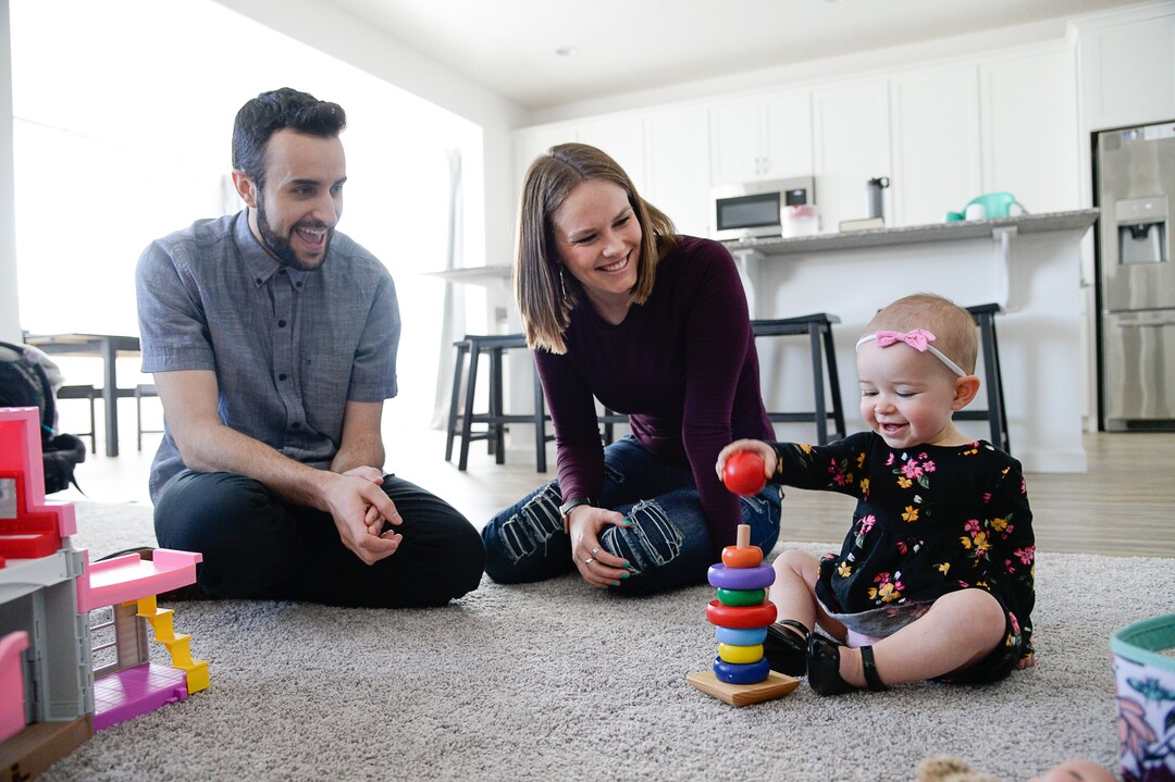 (Francisco Kjolseth  |  The Salt Lake Tribune)  Jeremy and Ember Ulrich spend time with their daughter Jemma, 1, at their home in Lehi after moving from Pleasant Grove last October because they could get more house for their money there, and it's closer to Jeremy's job at Adobe in Lehi.