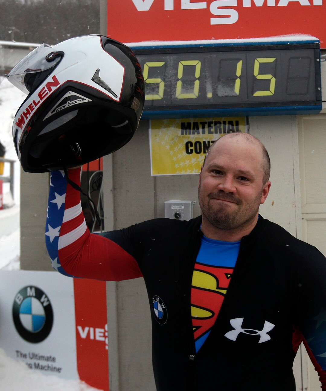 United States' pilot Steven Holcomb celebrates his team's win in the four-man bobsled World Cup event on Sunday, Dec. 15, 2013, in Lake Placid, N.Y. (AP Photo/Mike Groll)