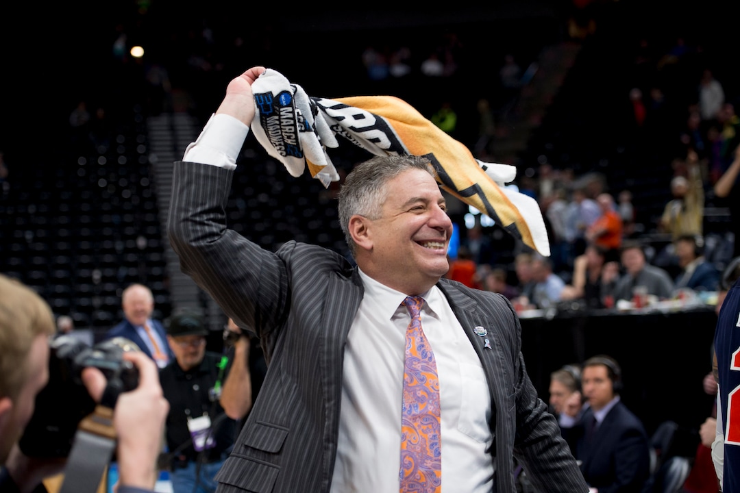 (Leah Hogsten  | The Salt Lake Tribune)  Auburn Tigers head coach Bruce Pearl celebrates after his team beat as Kansas in the second round of the NCAA tournament in Salt Lake City on Saturday, March 23, 2019.
