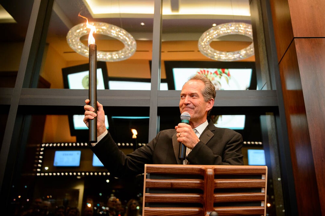 (Trent Nelson | The Salt Lake Tribune)  Mark Dietlein holds a torch while speaking, as Sandy's Hale Centre Theatre opened with a gala Thursday November 16, 2017.