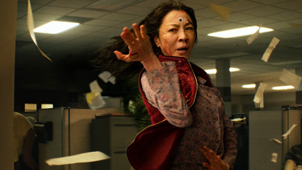 (A24) Michelle Yeoh plays Evelyn, a laundromat owner who finds herself at the center of a battle spanning multiple universes, in the comedy "Everything Everywhere All at Once." The movie was named the best picture of 2022 by the Utah Film Critics Association, which also awarded it in nine other categories.