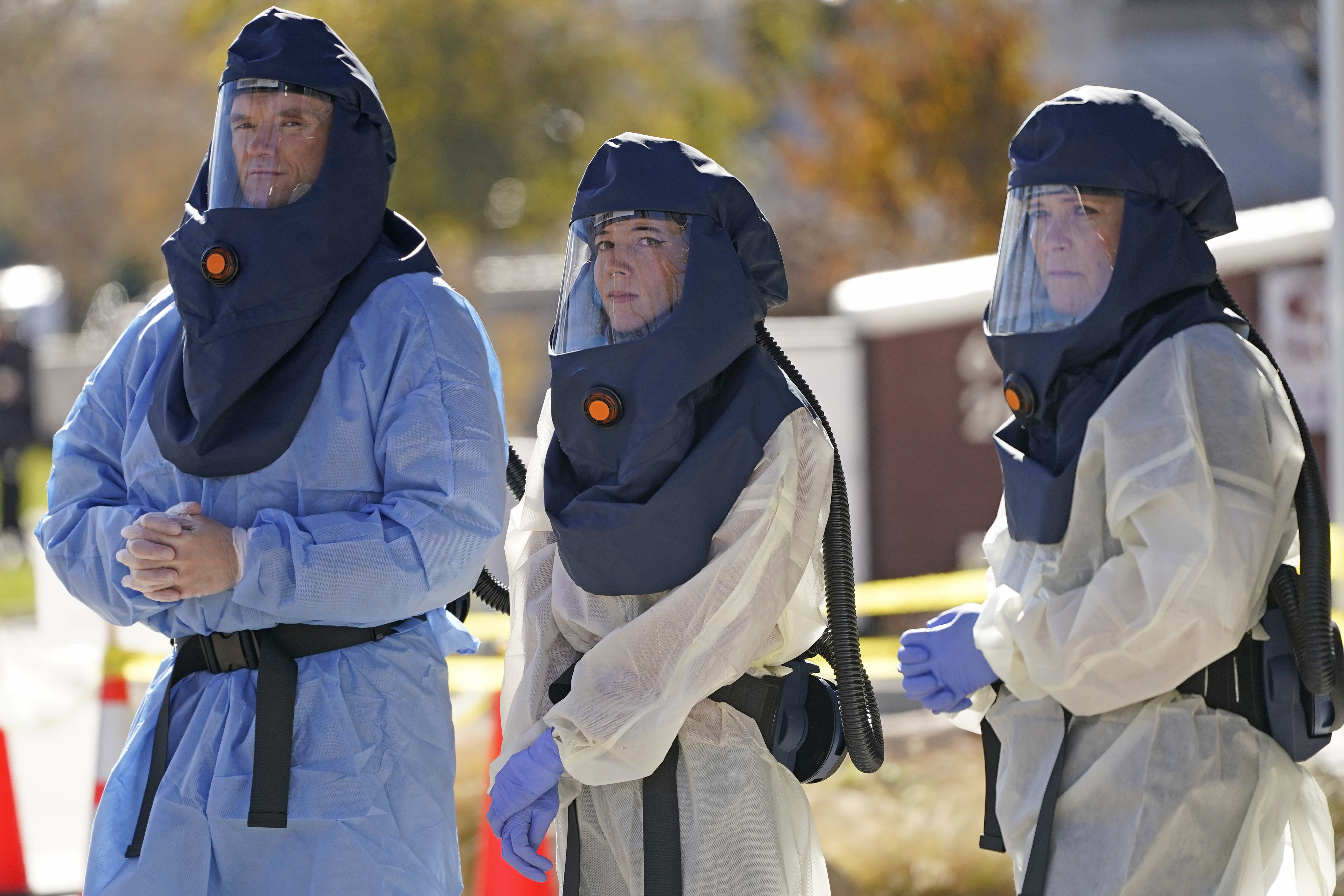 Salt Lake County Health Department public health nurses look on during coronavirus testing outside the Salt Lake County Health Department Thursday, Nov. 12, 2020, in Salt Lake City. Utah’s Division of Occupational and Professional Licensing is creating a temporary nursing apprentice license so nursing students can work in clinics.