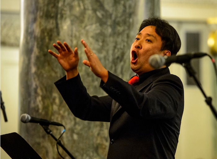(Steve Griffin  |  The Salt Lake Tribune)  Masa Fukuda directs the One Voice Children's Choir during a concert at the Joseph Smith Memorial Building in Salt Lake City Friday December 8, 2017.