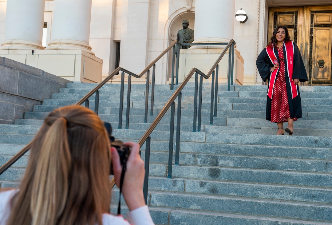 (Rick Egan  |  The Salt Lake Tribune)    Melissa Brewster poses for a graduation picture in front of the Park Building at the University of Utah, Thursday April 30, 2020