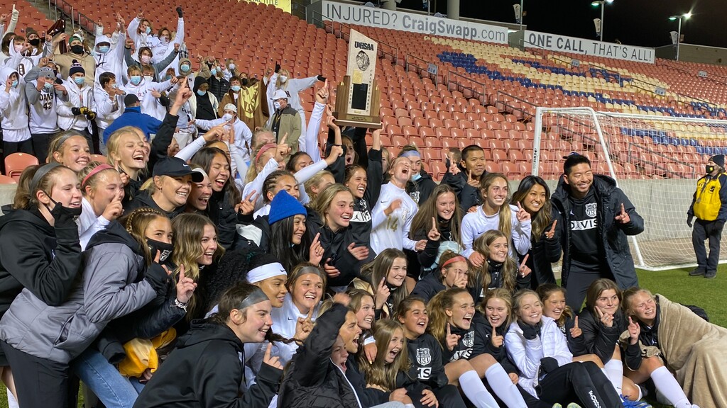 (Alex Vejar |  The Salt Lake Tribune) The Davis High School girls soccer team celebrates the 6A state title after beating American Fork 1-0 in extra time on Friday, Oct. 23, 2020, at Rio Tinto Stadium.