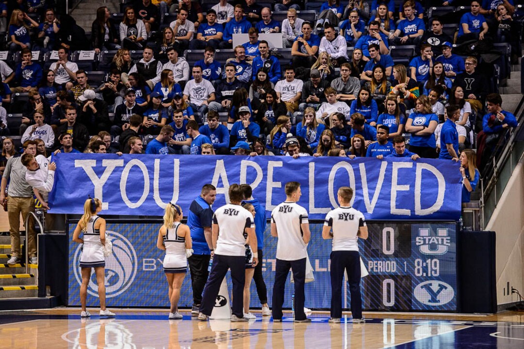 (Trent Nelson | The Salt Lake Tribune)  BYU fans with a banner that was briefly displayed before the game as BYU hosts Utah State, NCAA basketball in Provo on Wednesday Dec. 5, 2018.