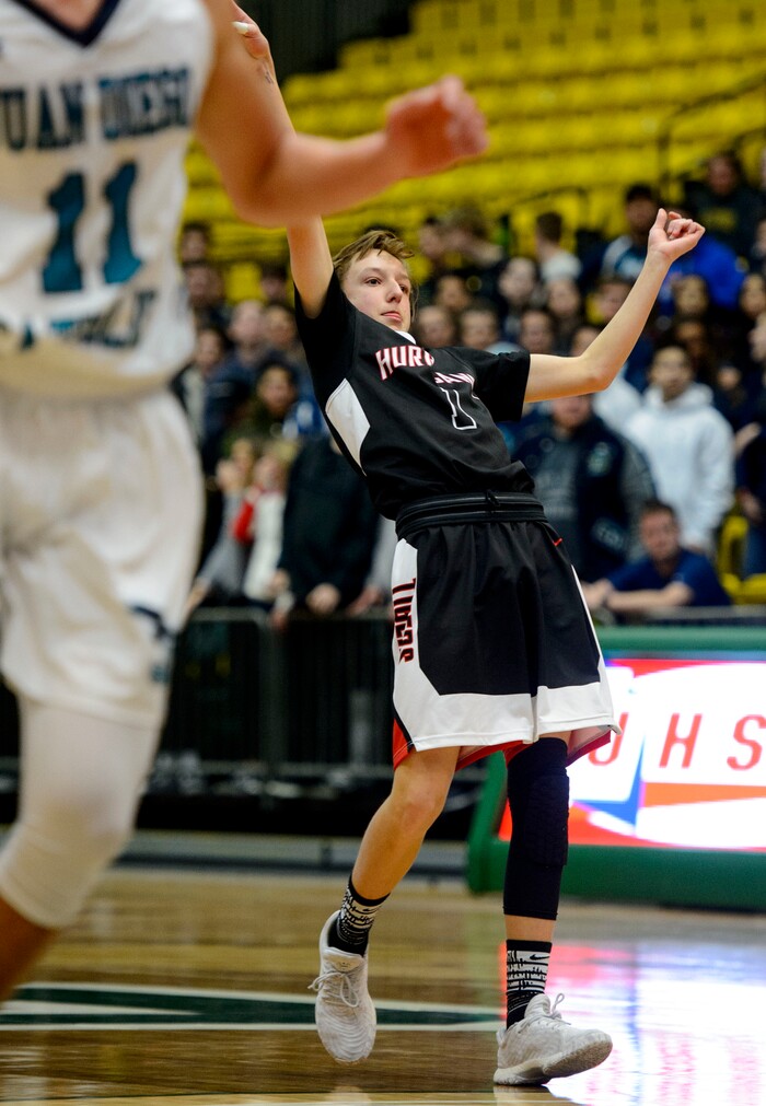 (Steve Griffin | The Salt Lake Tribune) Hurricane's Britt Esplin (1) leans back as he watches his three point shot bounce off the rim during 4A basketball playoff game against Juan Diego at the Utah Valley UniversityÕs UCCU Center in Provo Thursday March 1, 2018.