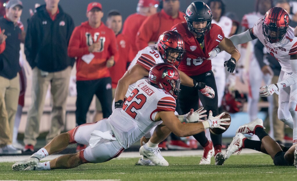 Utah Utes linebacker Chase Hansen (22) recovers a fumble against the NIU Huskies in the third quarter of play during a college football game at Huskie Stadium in DeKalb, IL on Saturday, Sept. 8, 2018 (Sean King | for The Salt Lake Tribune)