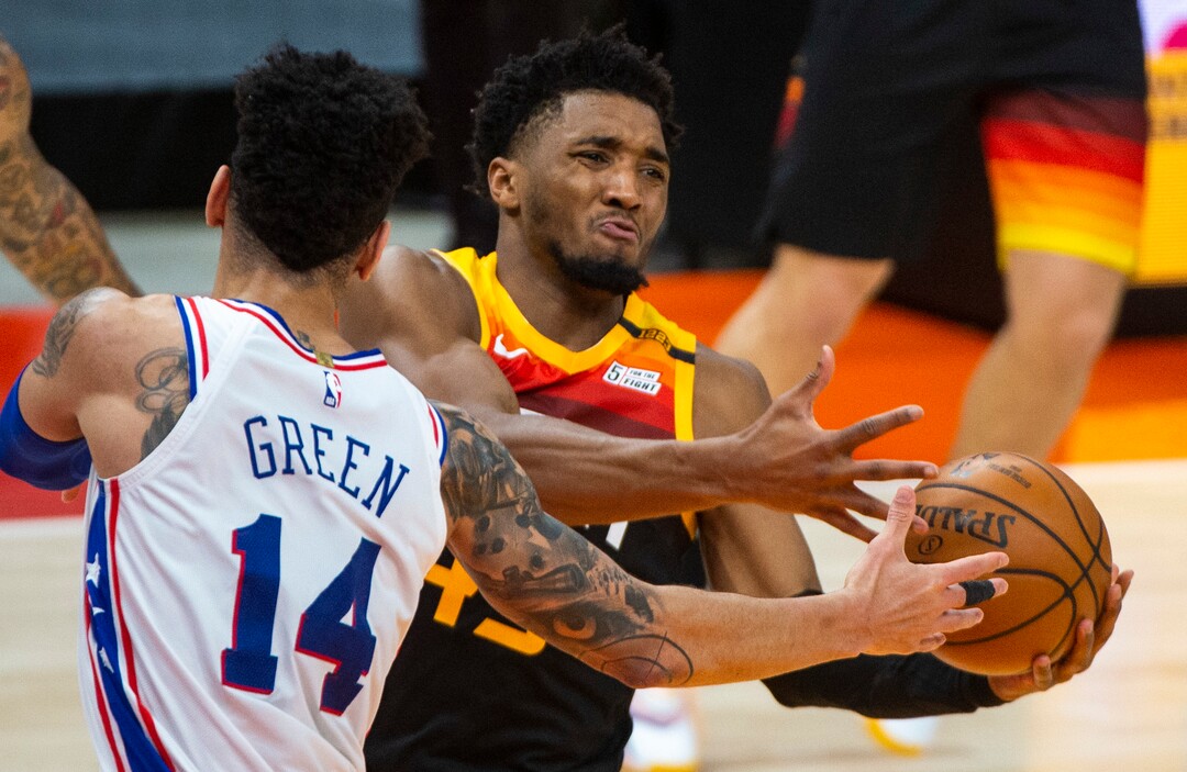 (Rick Egan | The Salt Lake Tribune) Utah Jazz guard Donovan Mitchell (45) foes to the hoop, as Philadelphia 76ers forward Danny Green (14) defends, in NBA action between the Utah Jazz and the Philadelphia 76ers at Vivint Arena, on Monday, Feb. 15, 2021.
