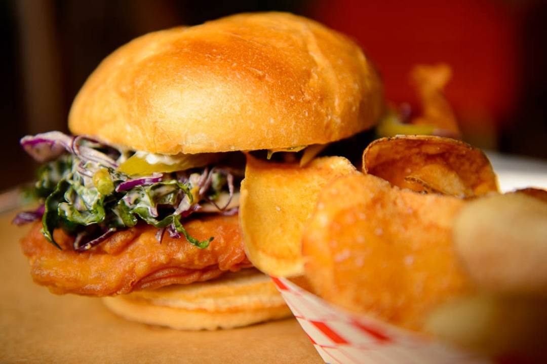 (Trent Nelson | The Salt Lake Tribune)  Nomad Eatery, a new fast-casual restaurant near the airport in Salt Lake City. The chef/owner is Justin Soelberg, who worked at Avenues Proper and Proper Burger before launching this new eatery. Thursday March 22, 2018. Fish sandwich.