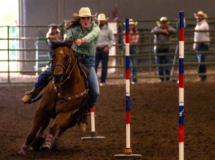 (Rick Egan | The Salt Lake Tribune) 
 Addyson Brown competes in the pole bending completion in the Panguitch Invitation Rodeo, on Saturday, July 23, 2022.
