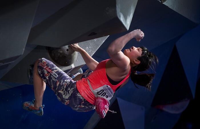 (Leah Hogsten  |  The Salt Lake Tribune) Ashima Shiraishi makes her move on the wall during USA Climbing's Bouldering Open National Championships at the Salt Palace Convention Center, Saturday, February 3, 2018 in Salt Lake City, UT. 

. 