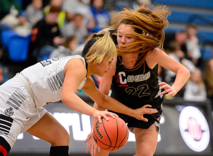 (Trent Nelson | The Salt Lake Tribune)  Riverton's Jaydeene Burgess (12) and American Fork's Jamie Shepherd (22) as Riverton faces American Fork in the 6A High School Girls' Basketball Tournament at SLCC in Taylorsville, Tuesday Feb. 20, 2018.