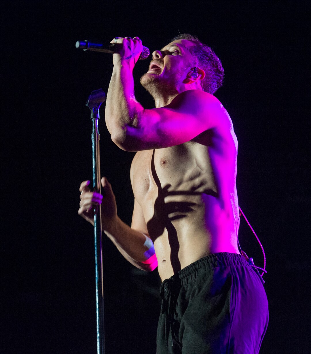(Rick Egan  |  The Salt Lake Tribune)     Dan Reynolds performs with Imagine Dragons, at the Loveloud Festival at Rice-Eccles Stadium, Saturday, July 28, 2018.