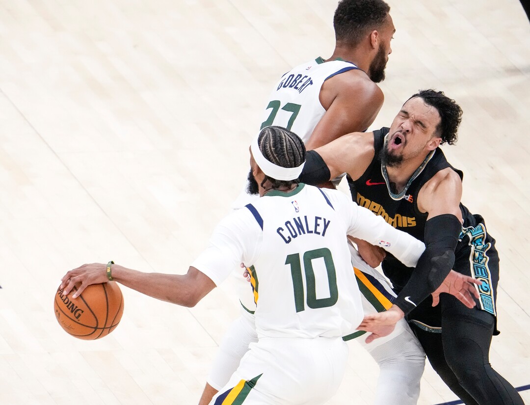 (Leah Hogsten | The Salt Lake Tribune) Utah Jazz center Rudy Gobert (27) and Utah Jazz guard Mike Conley (10) with the pick and roll on Memphis Grizzlies forward Dillon Brooks (24) as the Utah Jazz take on the Memphis Grizzlies during Game 1 of the first-round playoffs at Vivint Arena, May 23, 2021.