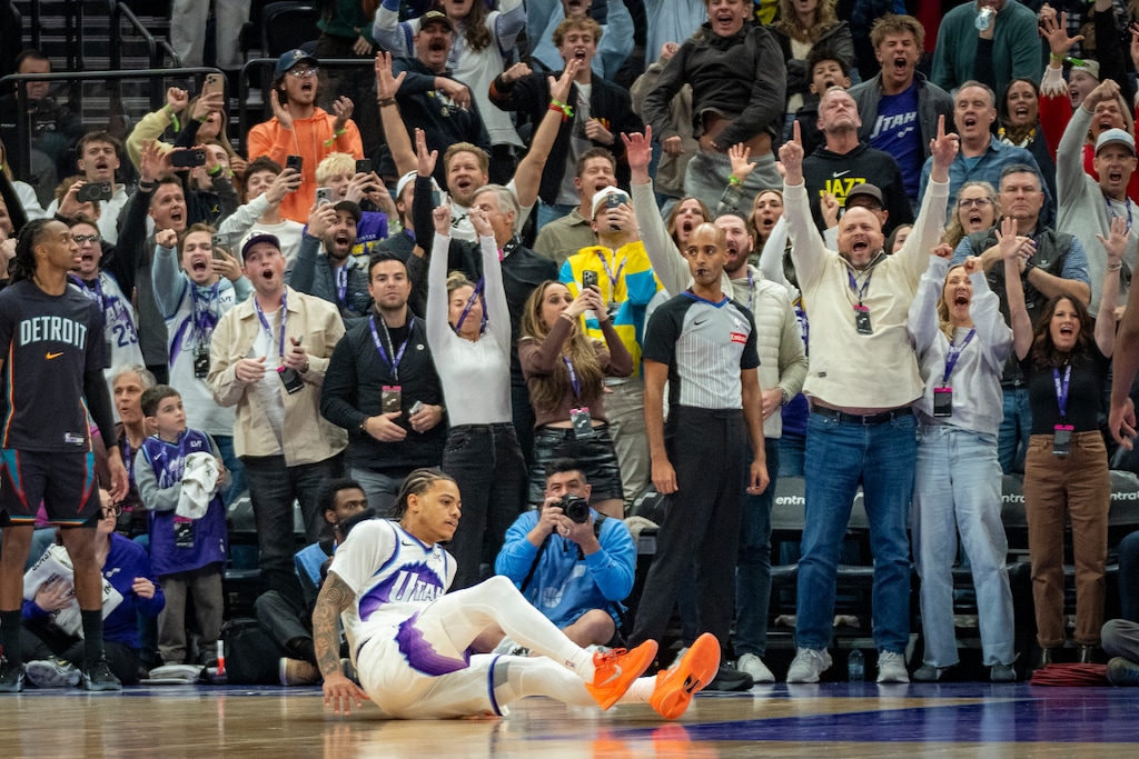 (Rick Egan | The Salt Lake Tribune) Utah Jazz fans cheer as Utah Jazz guard Keyonte George (3) slides across the floor after scoring the winning basket with 2.1 seconds left on Friday night.