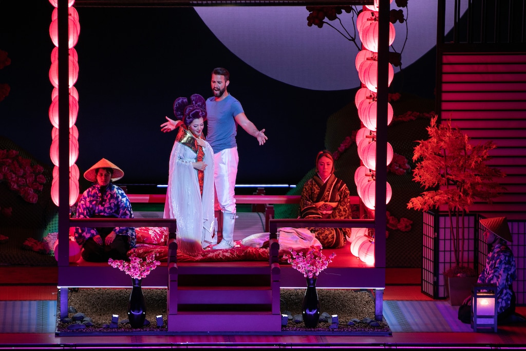 (Maddie McGarvey | The New York Times) Karah Son and Adam Smith, center, with other cast members in Cincinnati Opera's production of "Madame Butterfly," at the Cincinnati Music Hall in Cincinnati, July 17, 2023. Utah Opera will stage the same production of Puccini's classic in May 2025, the company announced on March 12, 2024.