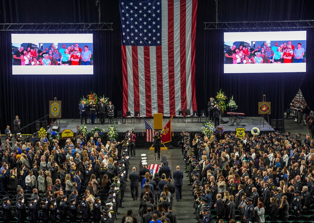 (Rick Egan  |  The Salt Lake Tribune)     The funeral procession enters the Maverik Center for the funeral for South Salt Lake police officer, David Romrell, who died after being struck by a car during a clash with two burglary suspects on Nov. 24. Wednesday, Dec. 5, 2018.