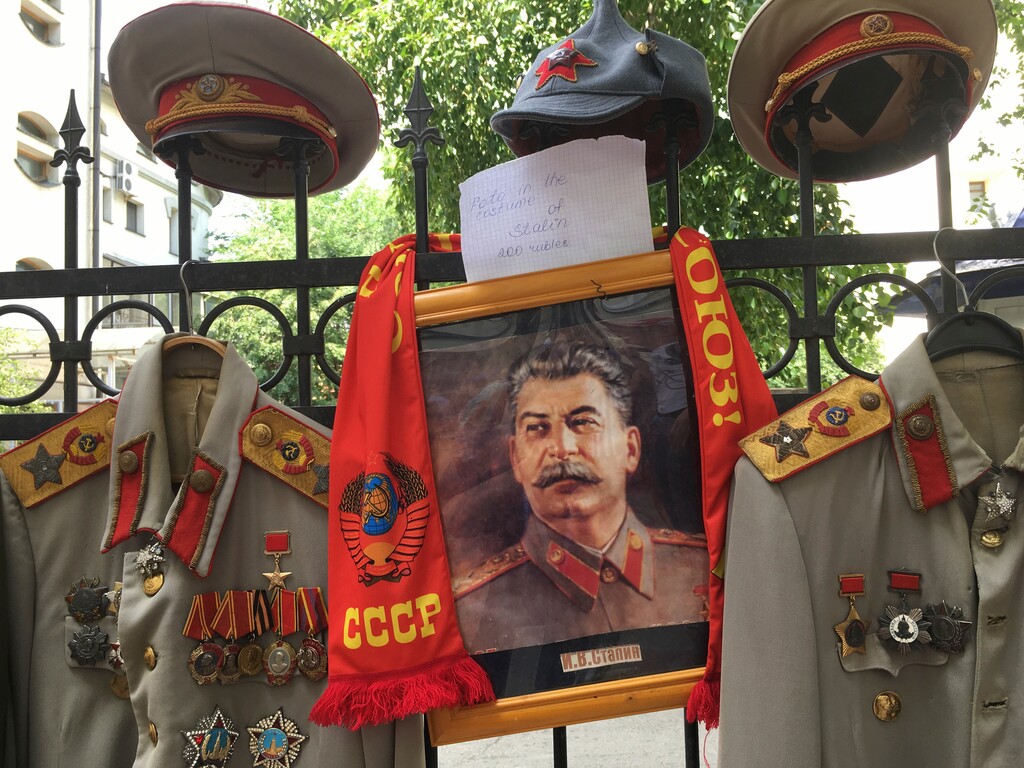 (Luis Andres Henao | The Associated Press) Replicas of Joseph Stalin uniforms are offered to tourists who can rent them and wear them for a picture outside Stalin's bunker in Samara, Russia, on Tuesday, June 26, 2018. Stalin's secret WWII bunker has become the unlikely meeting point for thousands of cheerful fans who have arrived to the city during the World Cup days.