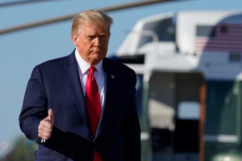 (Alex Brandon | AP file photo)  President Donald Trump gives a thumbs up as he walks to board Air Force One, Wednesday, Oct. 14, 2020, at Andrews Air Force Base, Md.