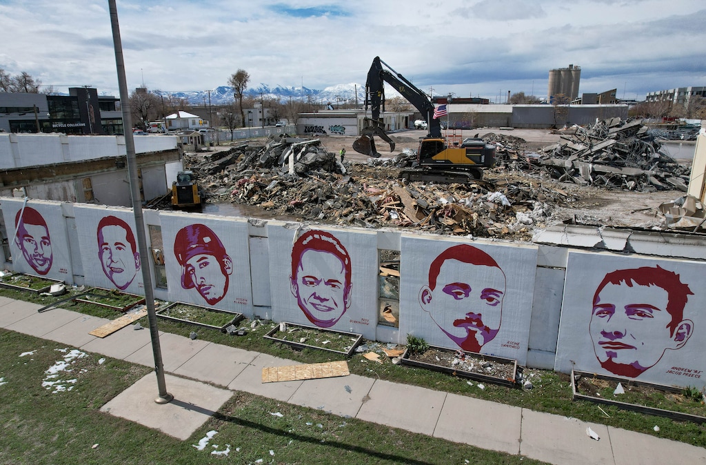 (Francisco Kjolseth | The Salt Lake Tribune) Demolition crews begin their work leveling the Fleet Block, including the memorialized faces of people killed by police, near 800 South and 300 West in Salt Lake City on Thursday, March 20, 2025.