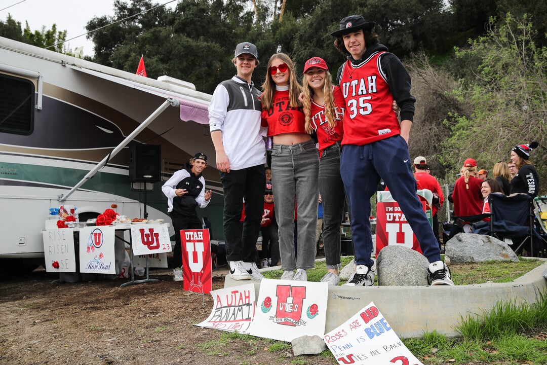 (Meg Oliphant | Special to The Tribune) Utah students Ashtyn Altenberg, Lilah Sage, Emory Warner, and Connor Hamlin pose for a photo at their tailgate ahead of the game between the Penn State Nittany Lions and the Utah Utes at Rose Bowl Stadium on Jan. 2, 2023 in Pasadena, Calif.