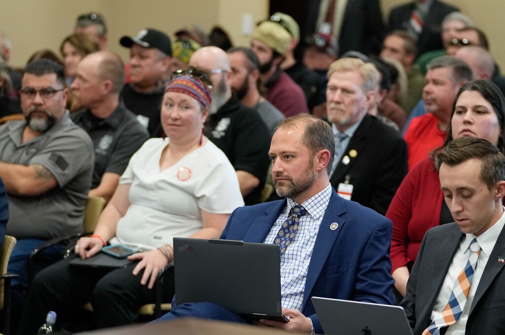 (Francisco Kjolseth | The Salt Lake Tribune) People pack the Senate Revenue and Taxation Committee hearing at the Capitol in addition to several overflow rooms to discuss HB267, a bill aimed at banning collective bargaining for public labor unions in Utah, sponsored by Rep. Jordan Teuscher, R-South Jordan, center right, in Salt Lake City on Wednesday, Jan 29, 2025.