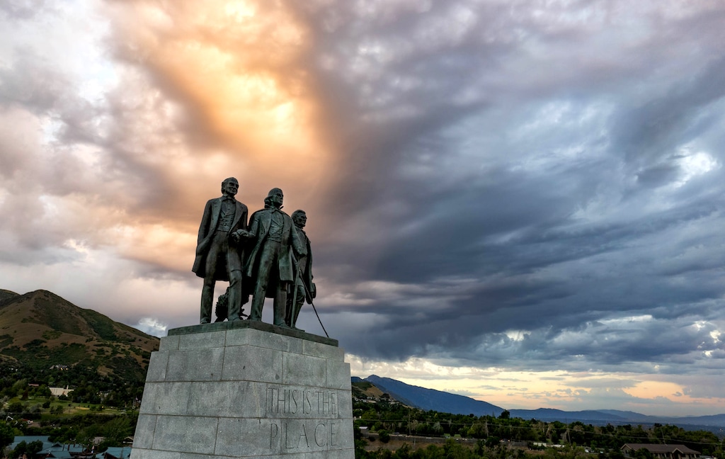 (Francisco Kjolseth | The Salt Lake Tribune) The sun rises over the Salt Lake Valley at This Is the Place Heritage Park in 2023.
