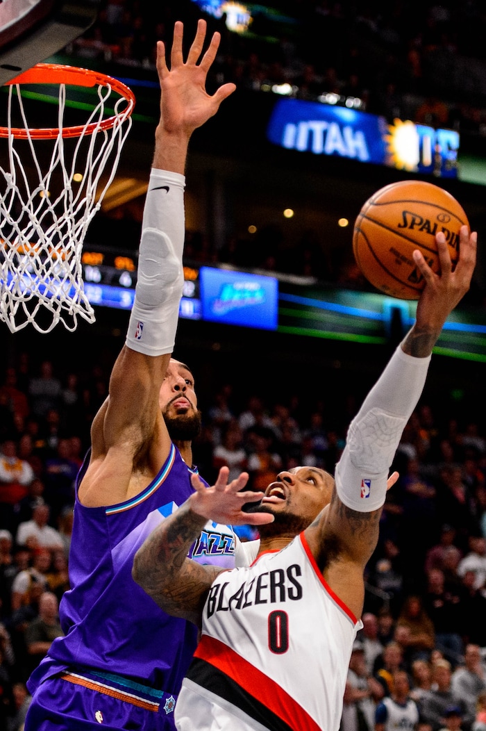 (Trent Nelson  |  The Salt Lake Tribune) Utah Jazz center Rudy Gobert (27) blocks a shot by Portland Trail Blazers guard Damian Lillard (0) with three seconds remaining, as the Utah Jazz host the Portland Trail Blazers, NBA basketball in Salt Lake City on Thursday, Dec. 26, 2019.