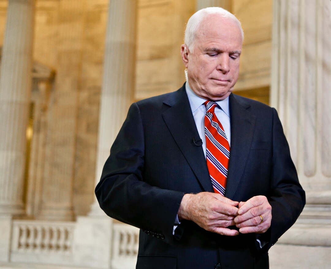 FILE - In this Sept. 3, 2013 file photo, Sen. John McCain, R-Ariz. pauses during a TV news interview on Capitol Hill in Washington. McCain’s family says the Arizona senator has chosen to discontinue medical treatment for brain cancer.  (AP Photo/J. Scott Applewhite)