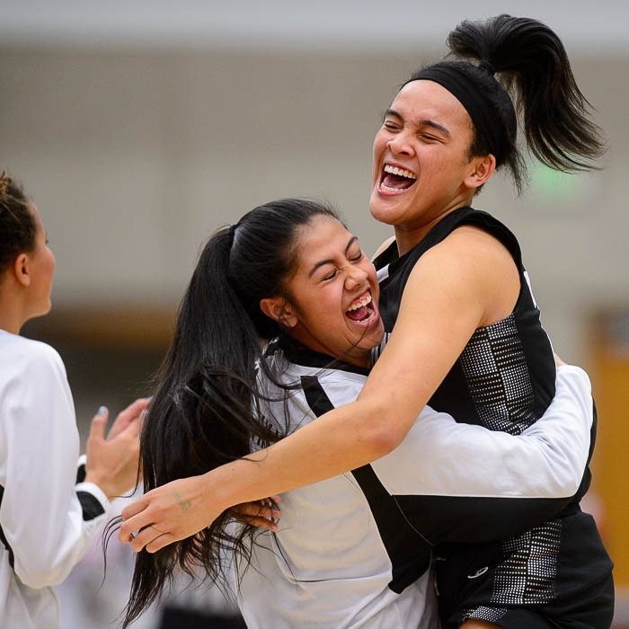 (Trent Nelson | The Salt Lake Tribune)  Highland's Kuulei Makaui (2) and Highland's Kaija Glasker (22) celebrate the win as Woods Cross faces Highland in the 5A High School Girls' Basketball Tournament at SLCC in Taylorsville, Wednesday Feb. 21, 2018.