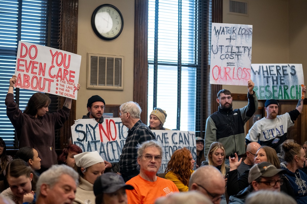 (Trent Nelson  |  The Salt Lake Tribune) People debate the project as the Box Elder County Commission prepared to meet on a MIDA data center project in Brigham City on Monday, April 27, 2026.
