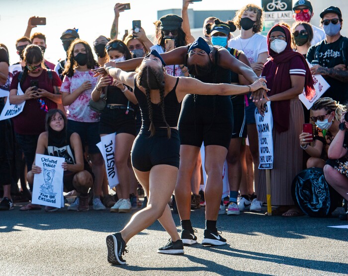 (Rick Egan  |  The Salt Lake Tribune)     Ballet West dancers Chelsea Keefer and Jazz Bynum perform a special dance on State Street in Salt Lake City, during the Dance Dance Revolution protest for racial equality, on Sunday, Aug. 9, 2020.