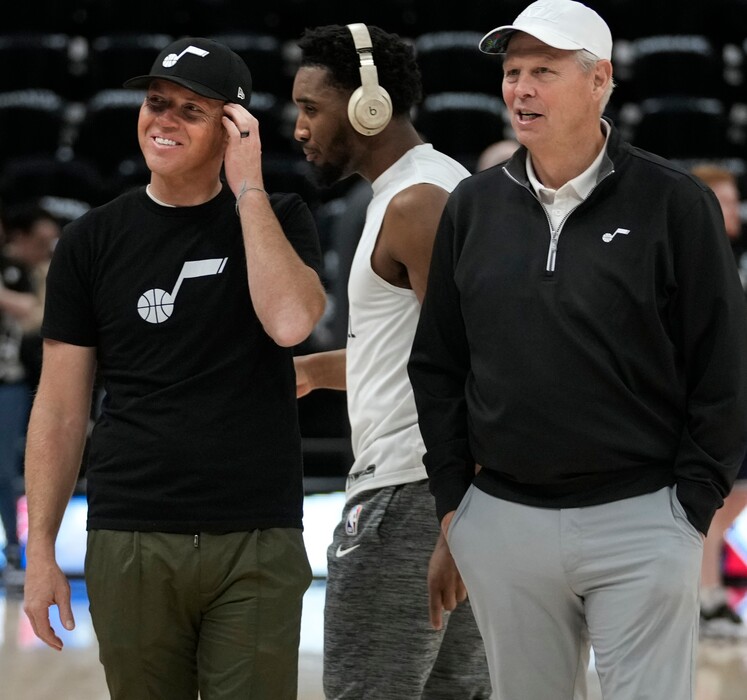 (Leah Hogsten | The Salt Lake Tribune)  l-r Utah Jazz owner Ryan Smith, Utah Jazz guard Donovan Mitchell (45) and  Danny Ainge, Utah Jazz CEO of Basketball Operations talk on the court during warmups prior to Game 6 of the 2022 NBA first-round playoff series against the Dallas Mavericks, Saturday, April 23, 2022, in Salt Lake City.