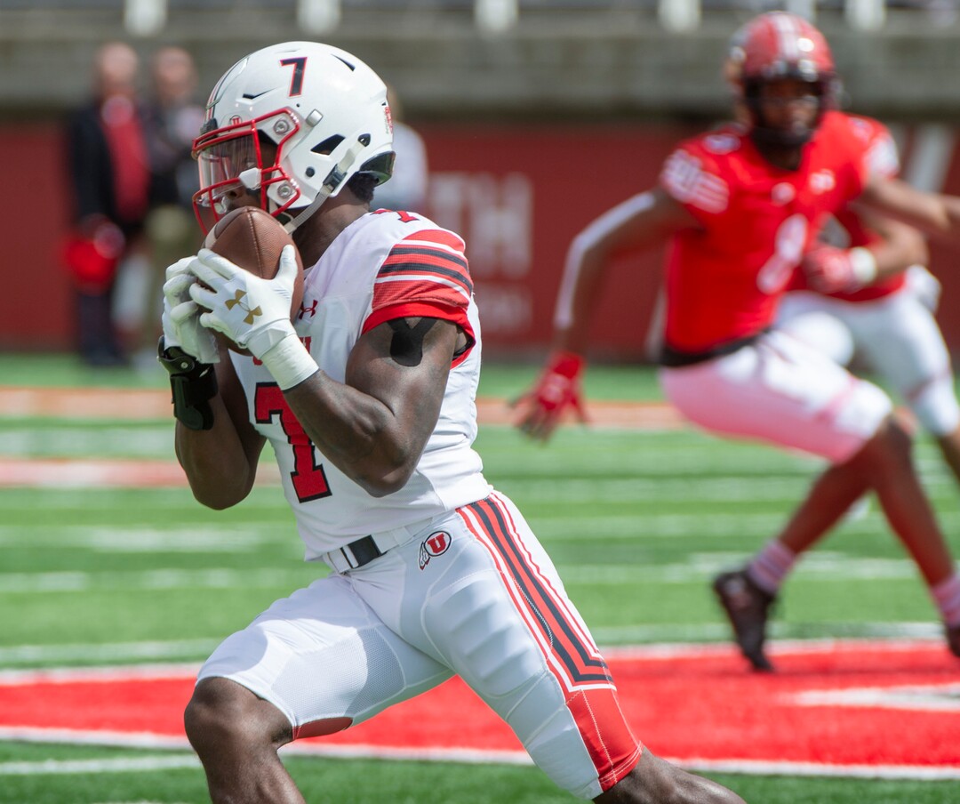 (Rick Egan  |  The Salt Lake Tribune)  Running back Devonta'e Henry-Cole runs the ball for the white team, in Utah's spring Red-White game at Rice-Eccles Stadium, Saturday, April 13, 2019.
